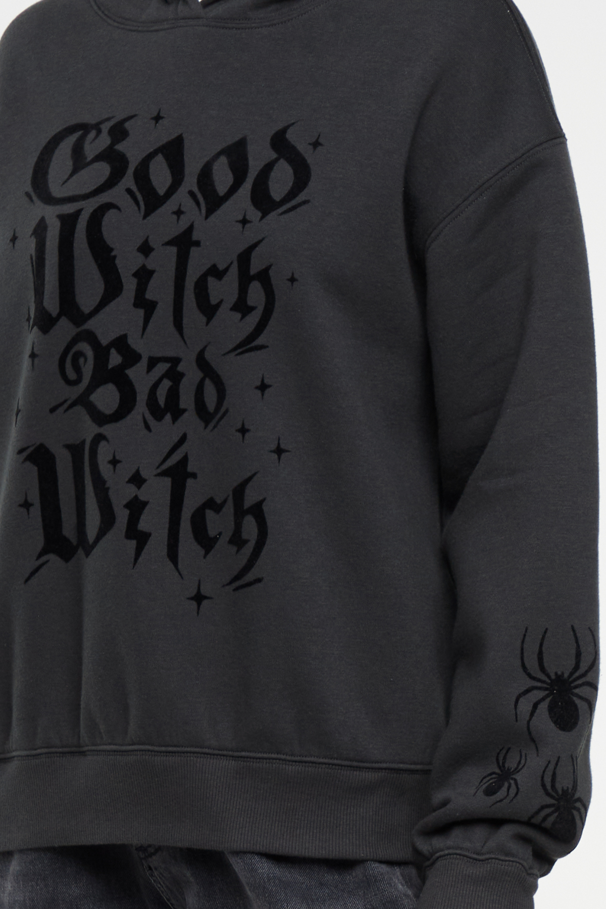 Close up of black hoodie with &