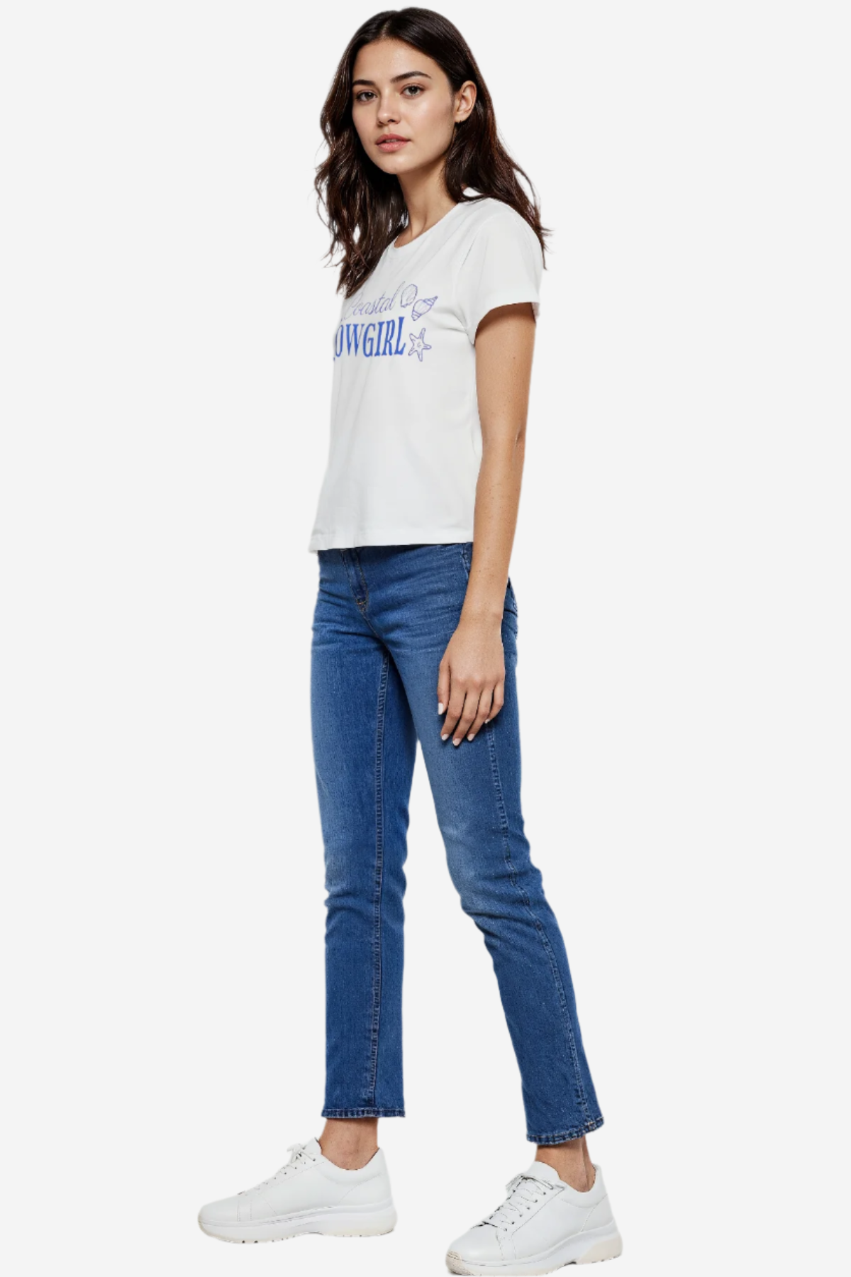 A woman wearing a white crop top with the text &