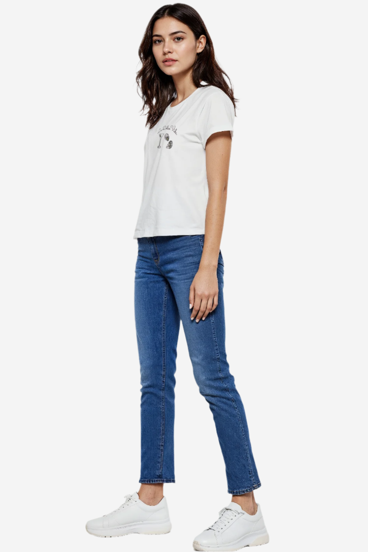 A woman wearing a white crop tee with the text &