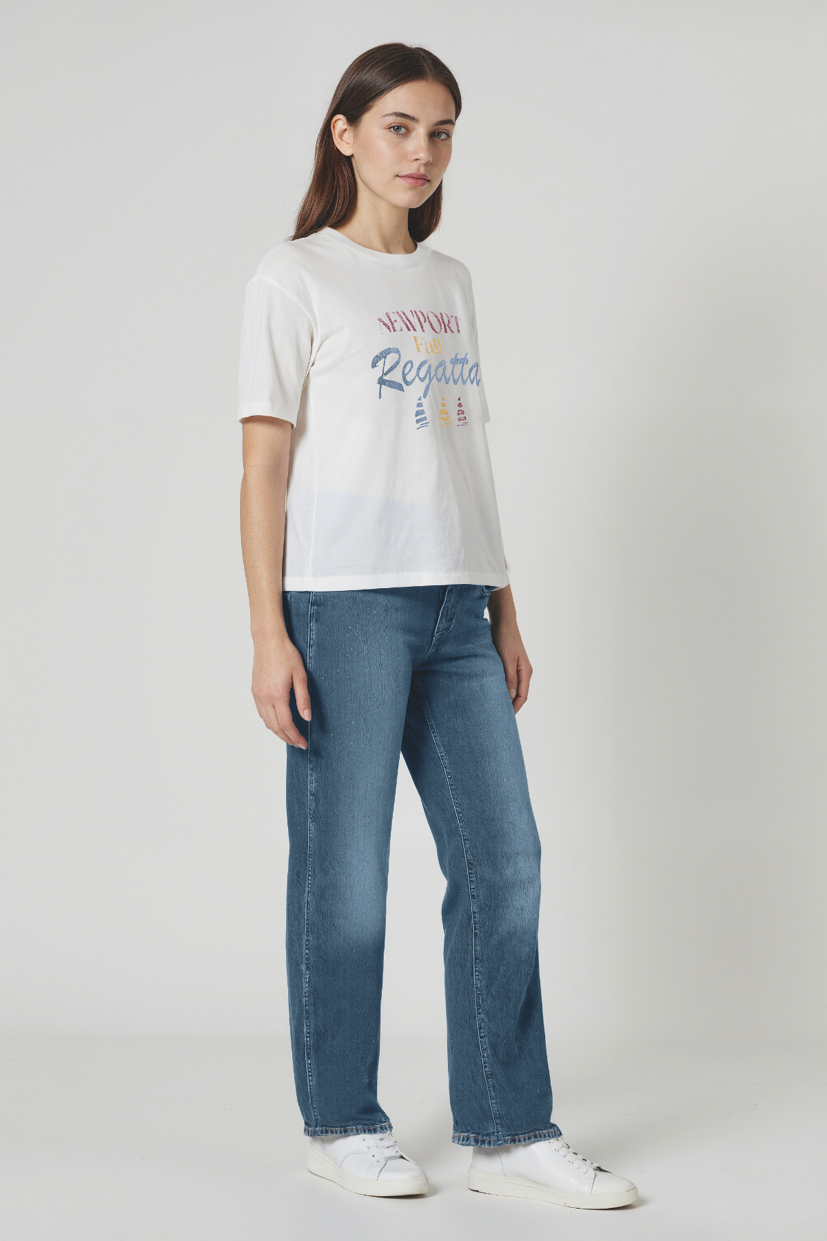 Woman wearing a white t-shirt with &