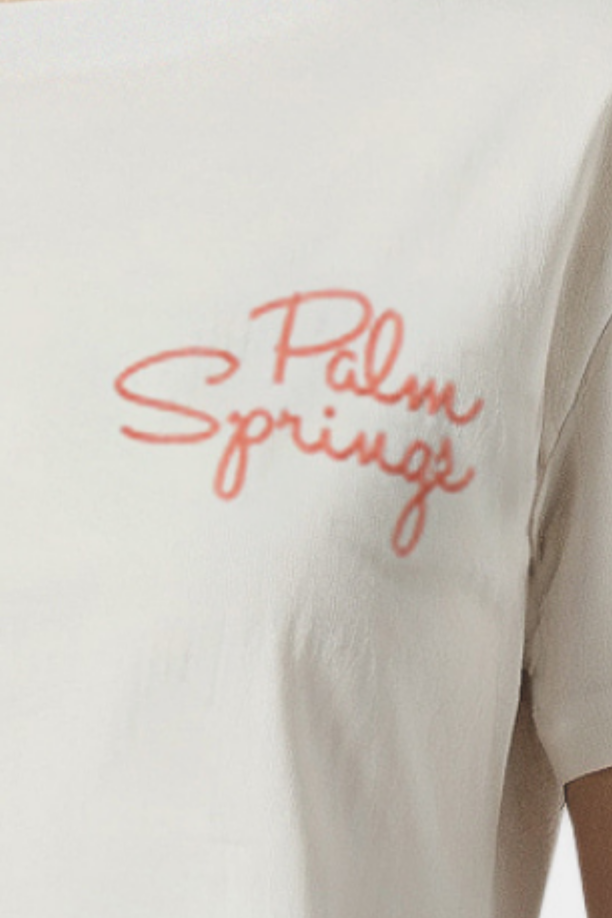 Close up of white shirt with &