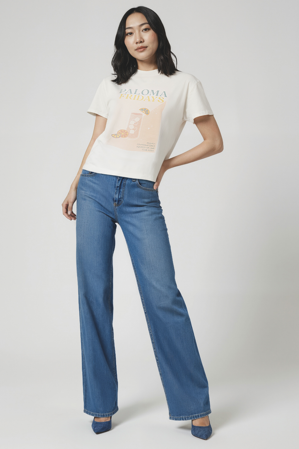 Woman wearing a white t-shirt with &
