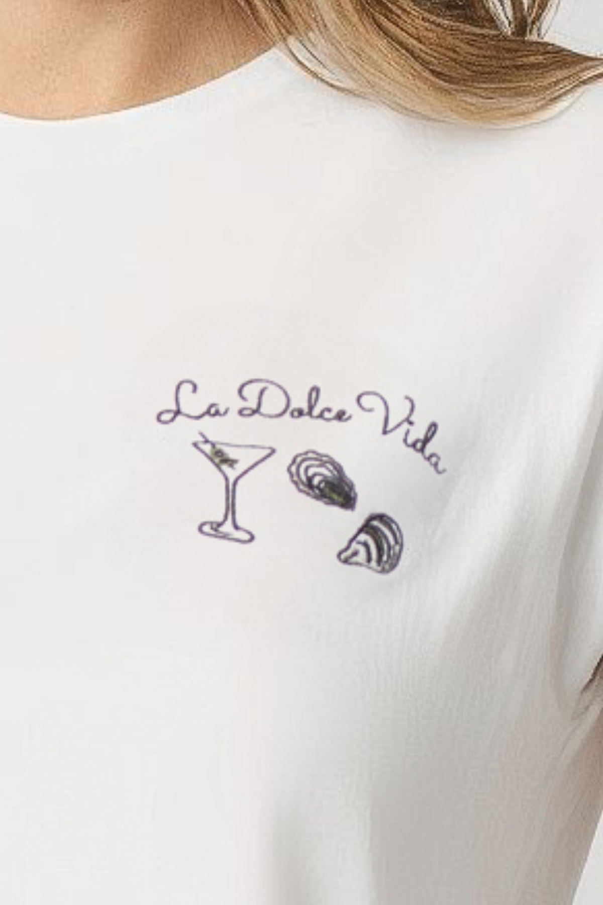 Close up of white t-shirt with &