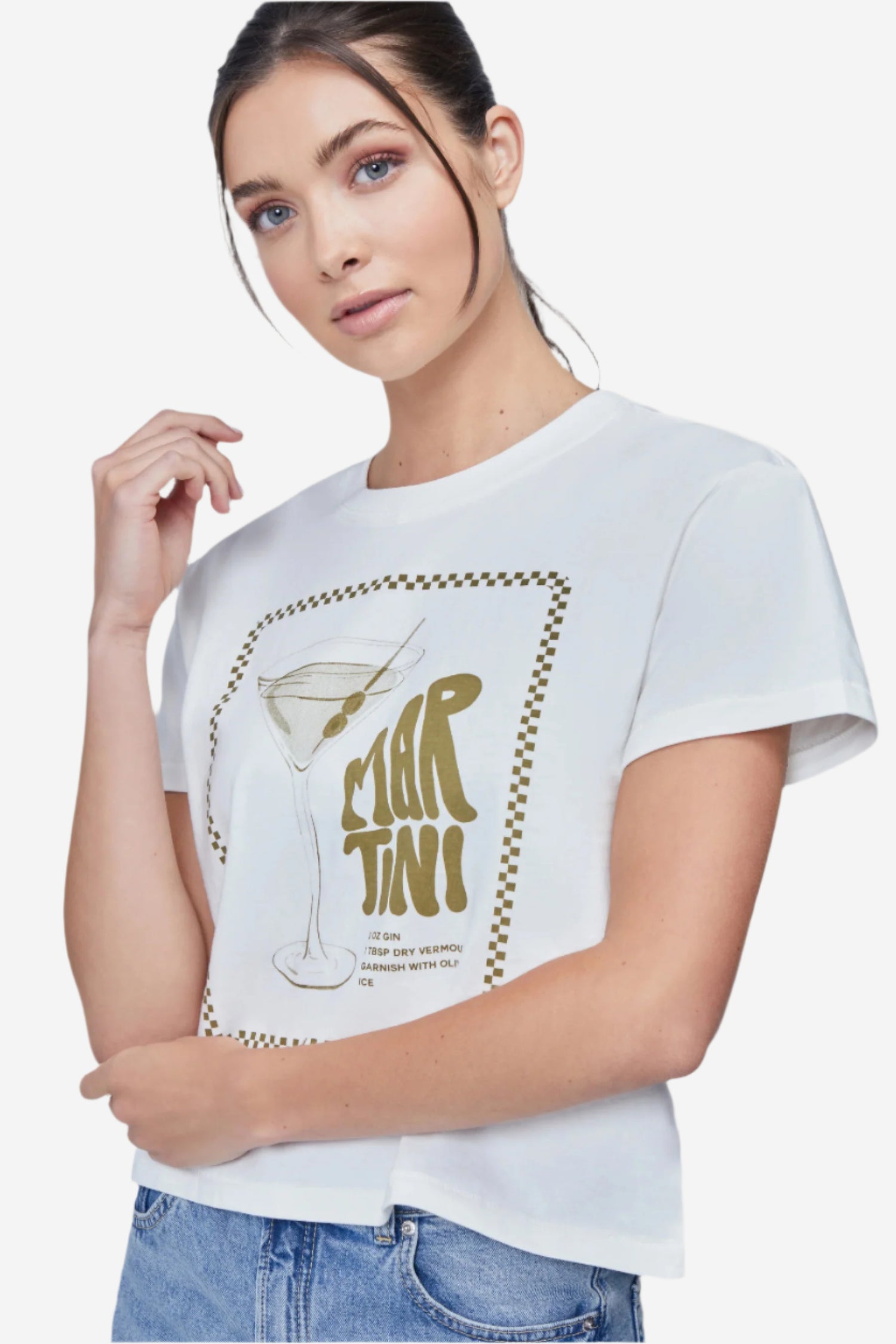 A woman wearing a white crop top with a martini glass graphic and text that includes &