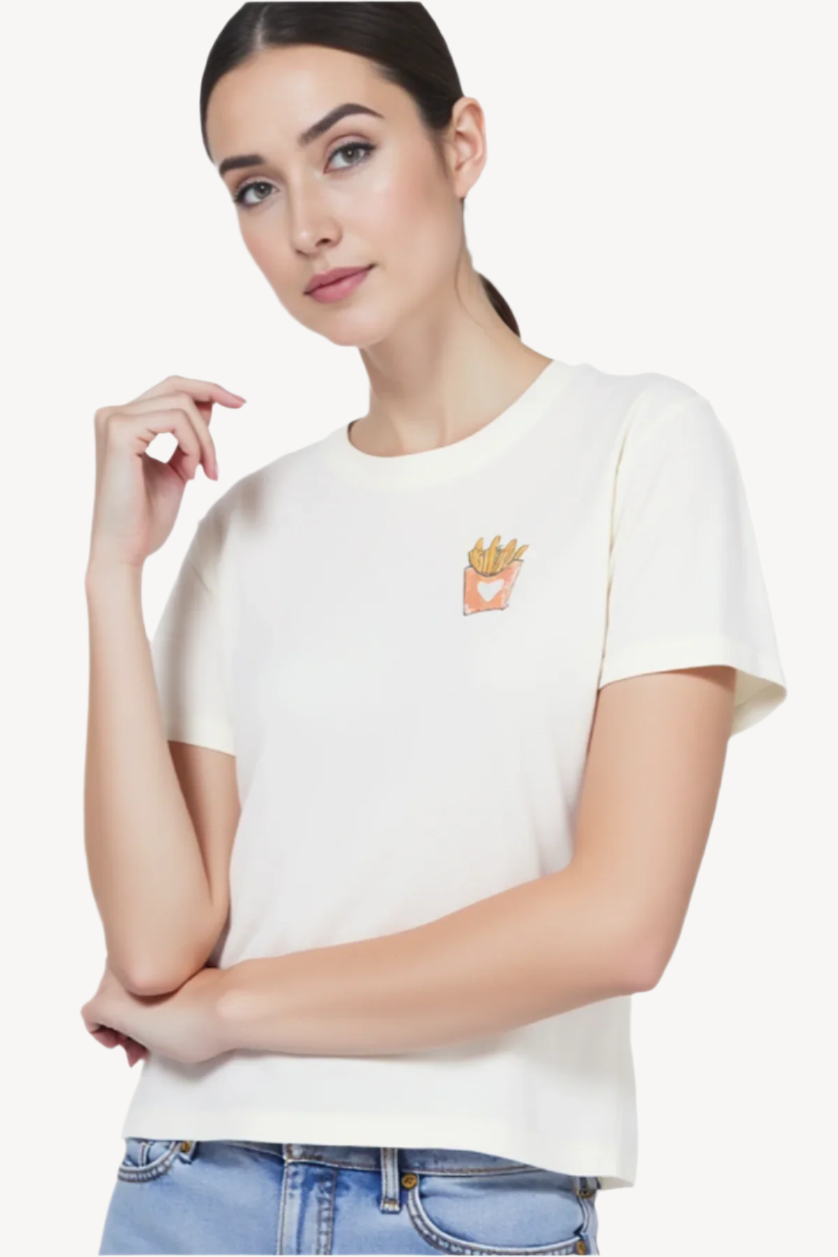 Woman wearing a white t-shirt with a small fires image design on a white background