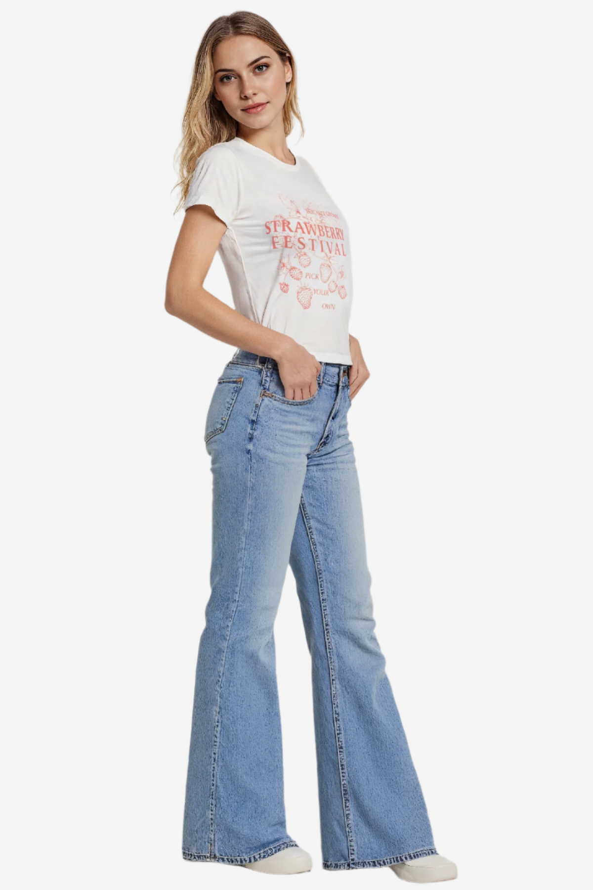 A woman wearing a white crewneck t-shirt with &