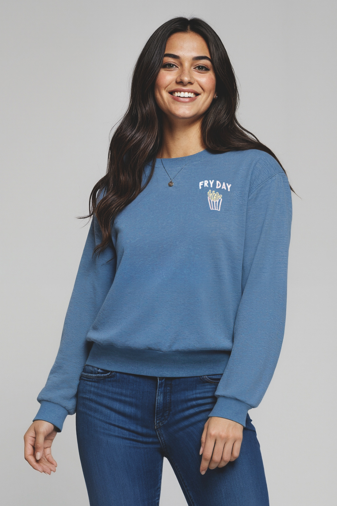 Woman wearing a blue sweatshirt with a with &