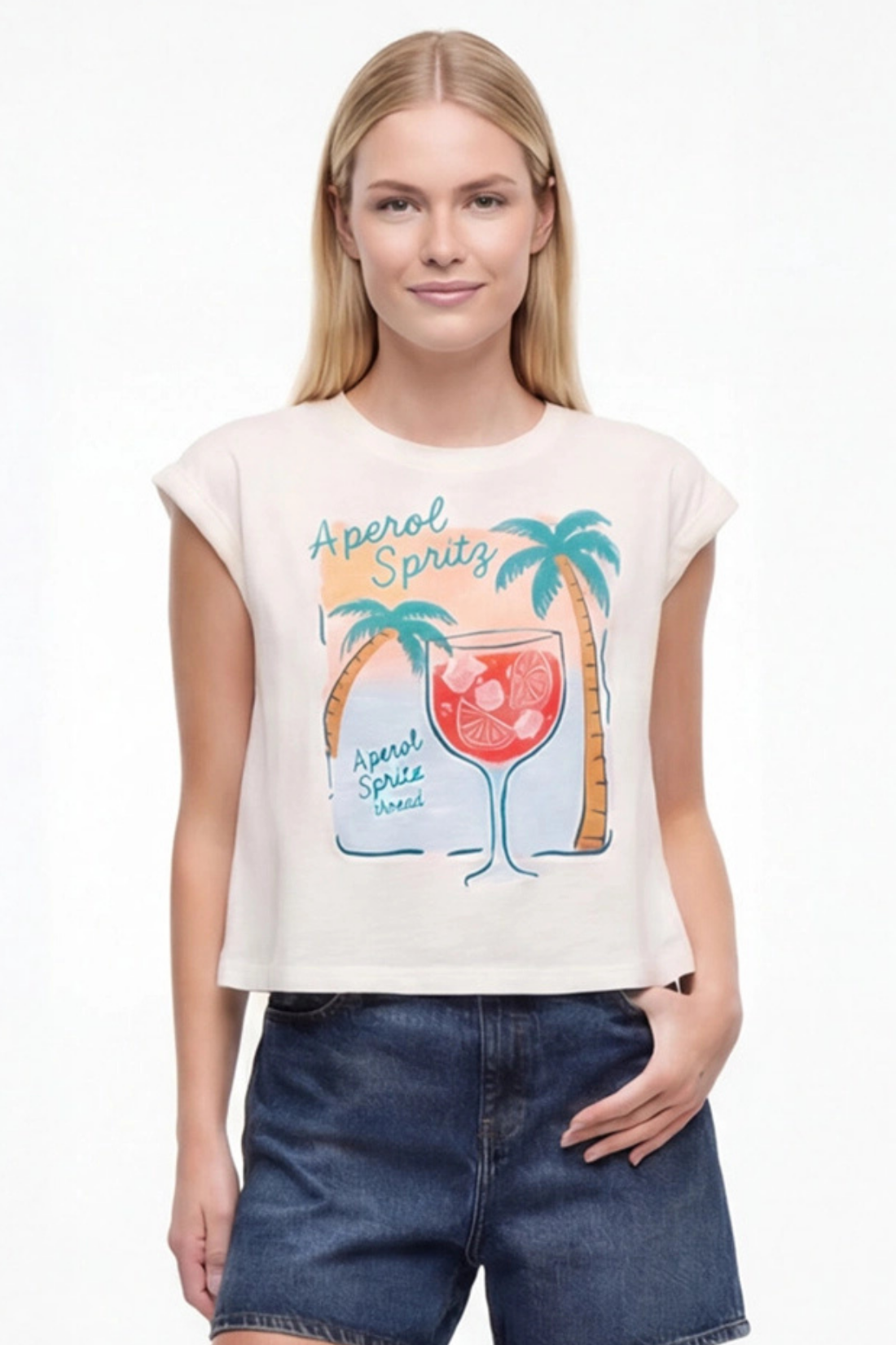 Front view of white t-shirt with "Aperol Spritz; Aperol State of Mind" text and graphic design featuring a cocktail and palm trees on a white background.