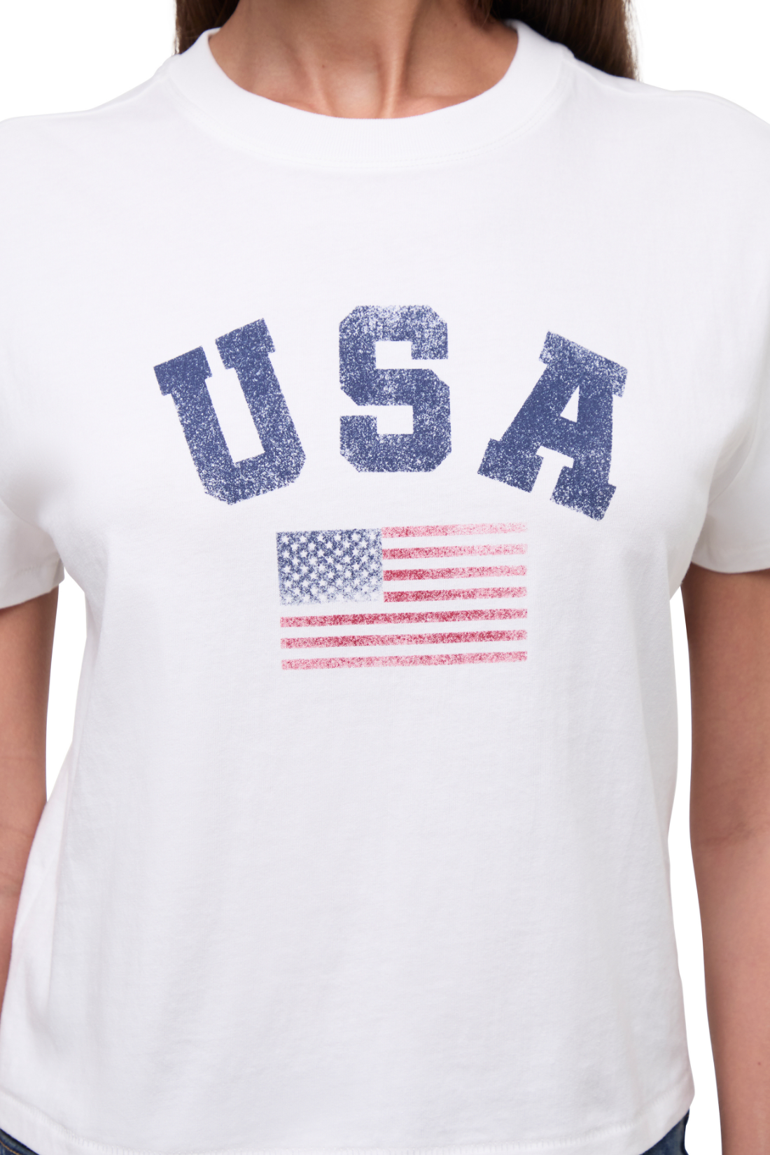 Close-up view of woman wearing a white t-shirt with &
