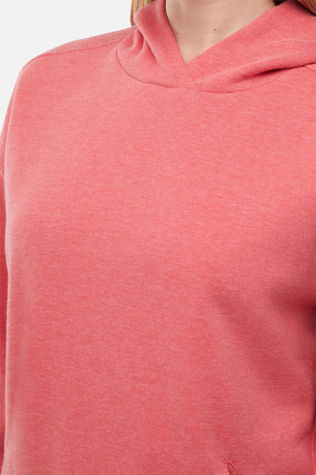 Close-up of a pink/red hoodie with a plain background