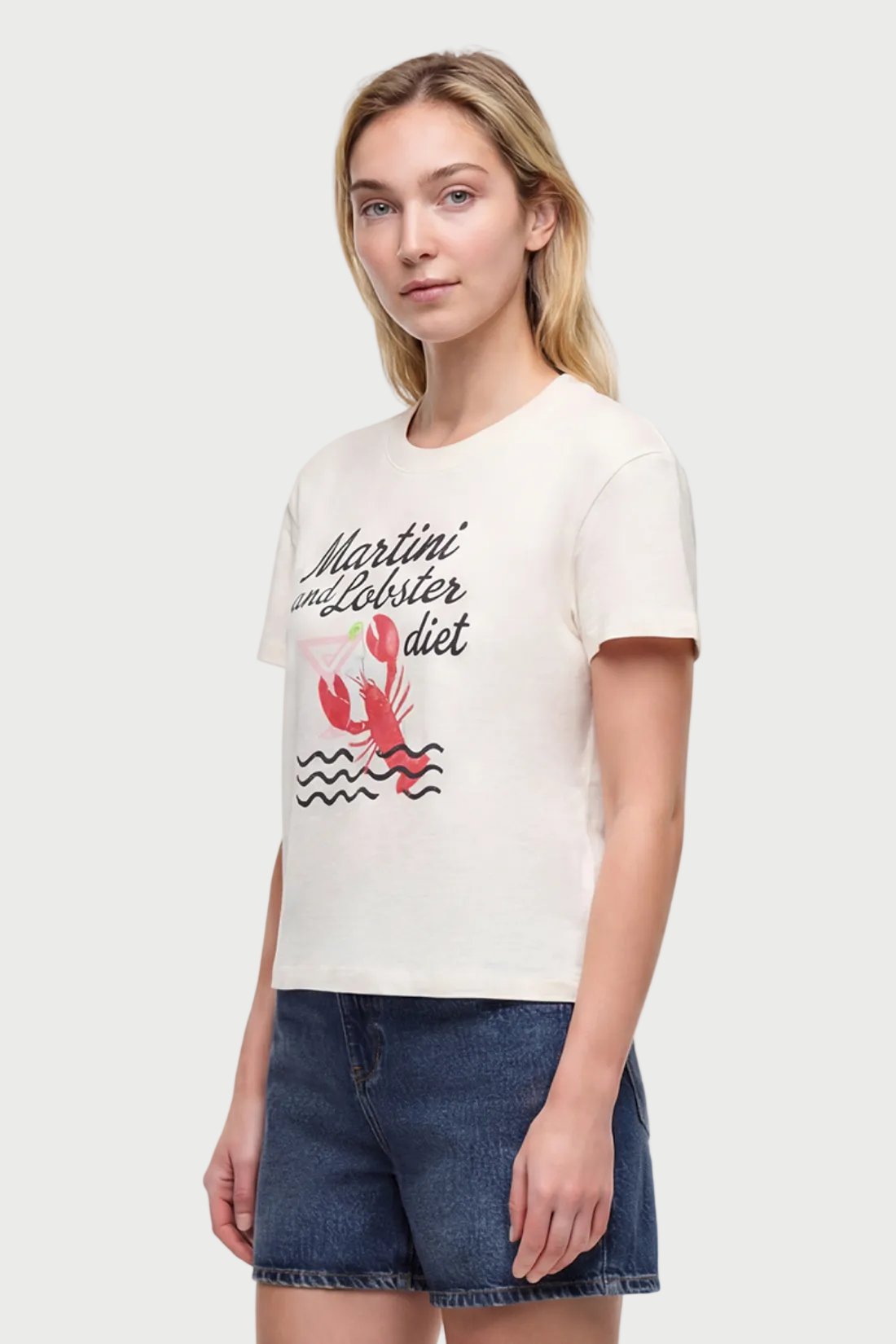 Side view of woman wearing a white t-shirt with &