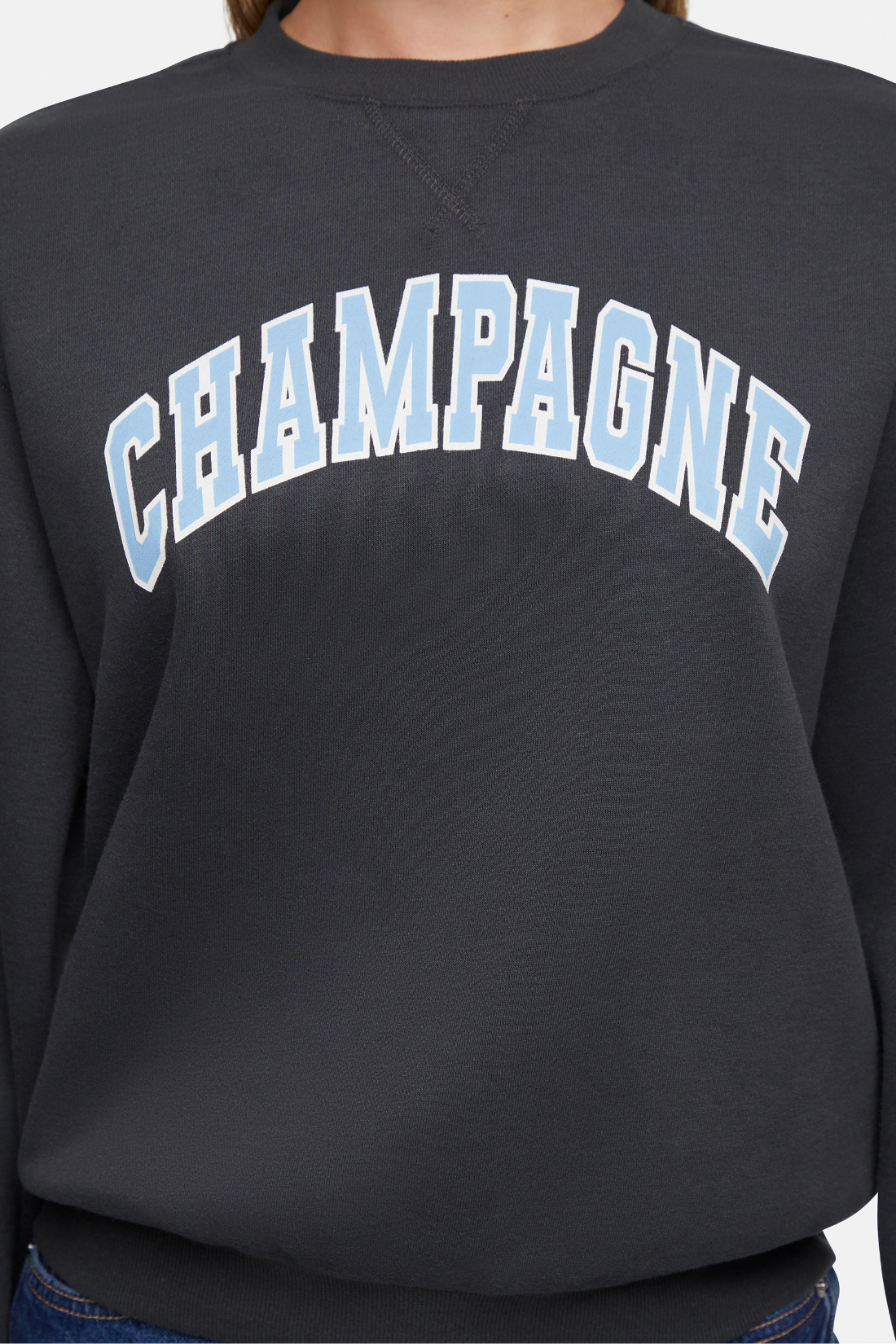 Close uo of black sweatshirt with &