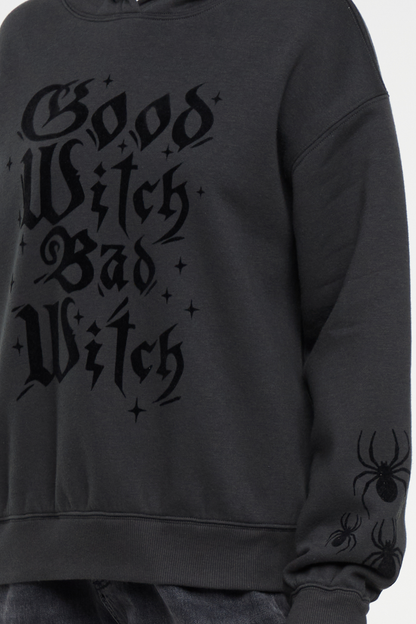 Close up of black hoodie with  &