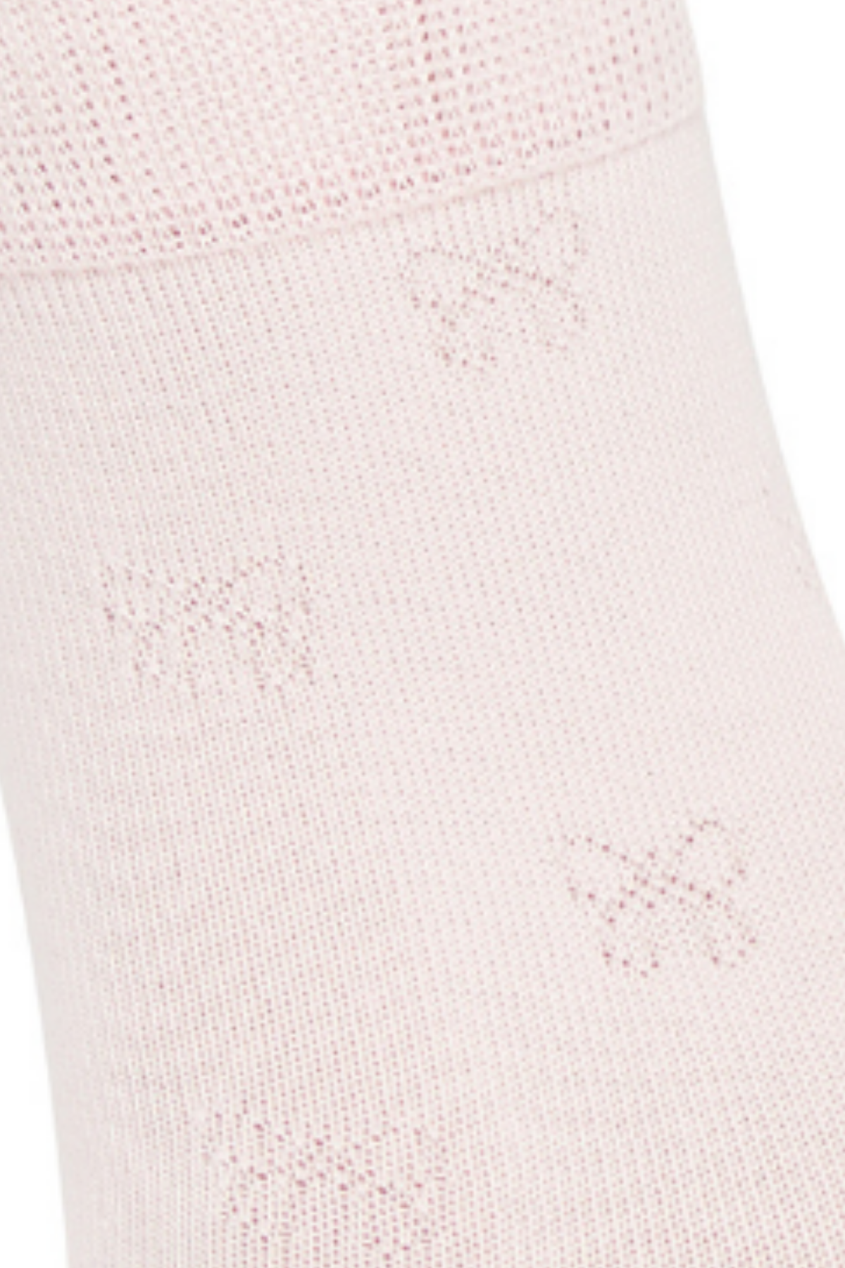 Close-up of a pink sock with embossed bow textured print fabric.