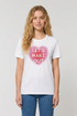 Woman wearing white t-shirt with pink heart and text &