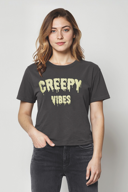 Woman wearing a black t-shirt with &