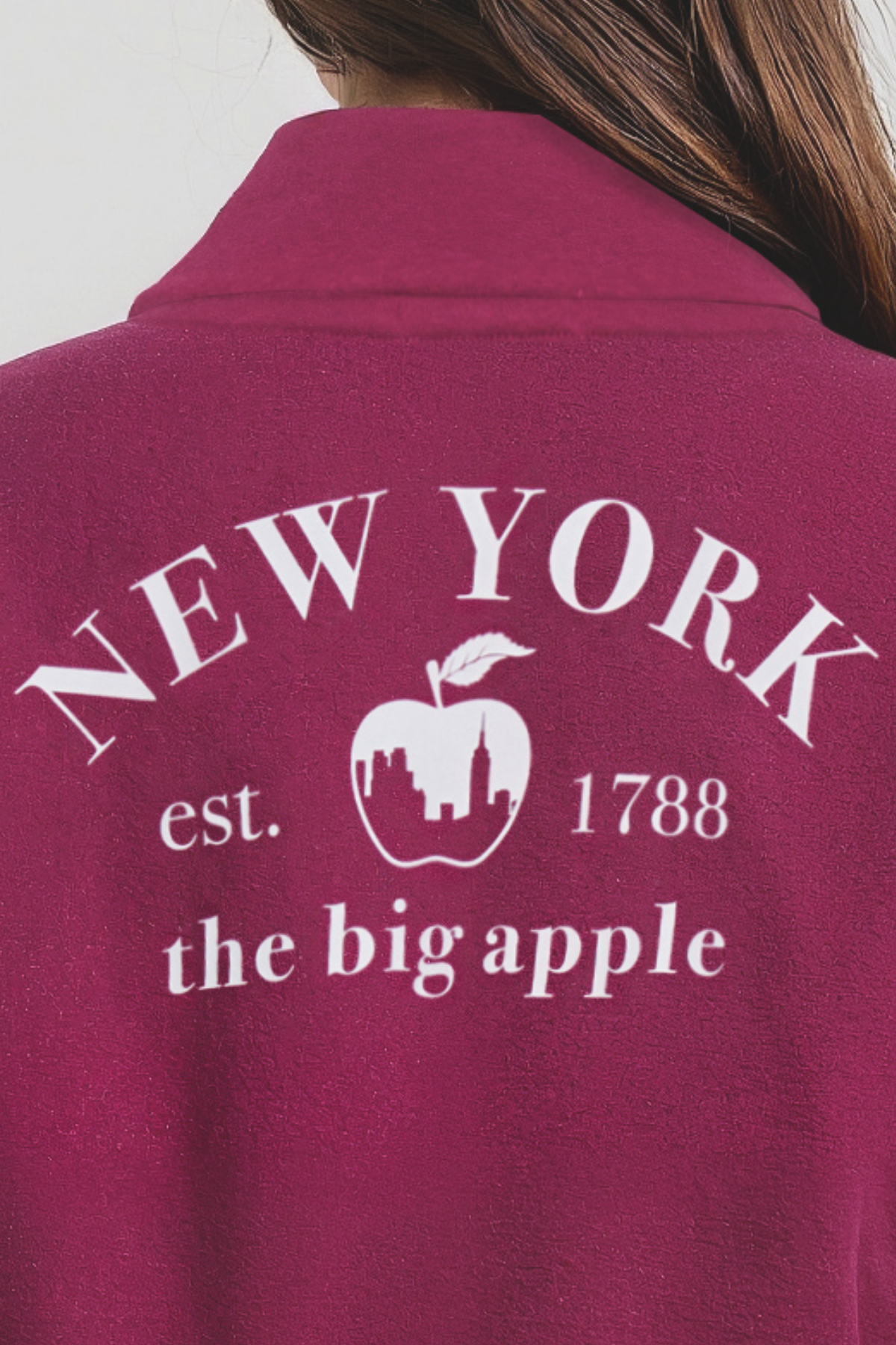 Close up of back of Maroon jacket with &