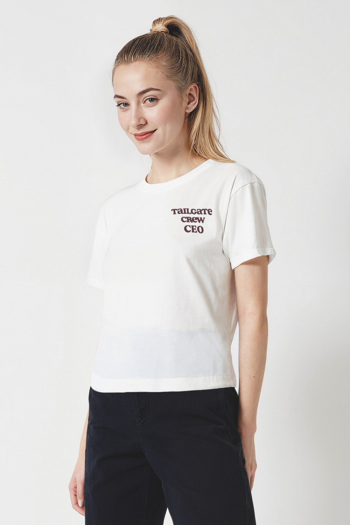 Woman wearing a white t-shirt with &