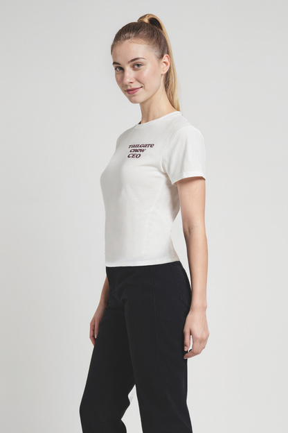 Woman wearing a white t-shirt with text on a plain background