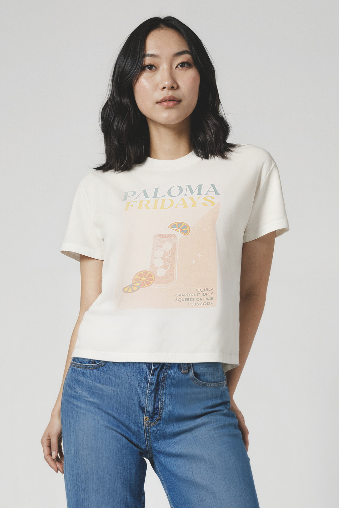 Woman wearing a white t-shirt with &