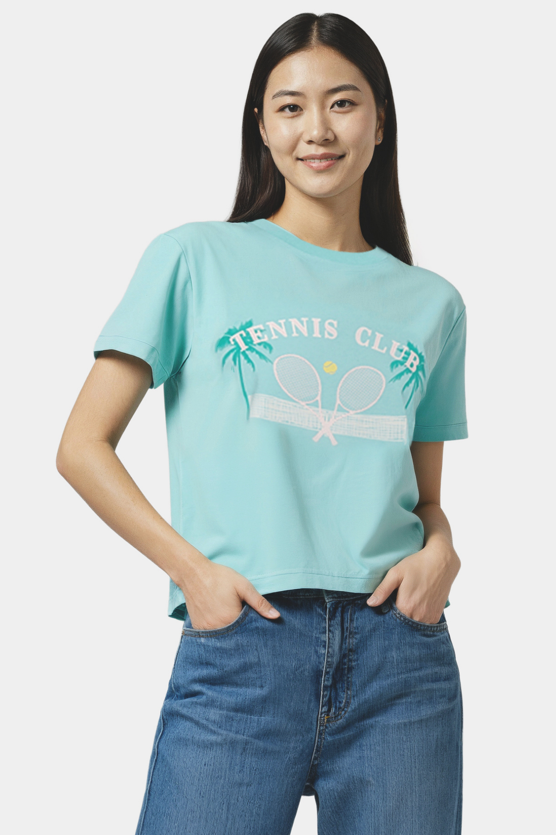 Woman wearing a light teal blue t-shirt with &