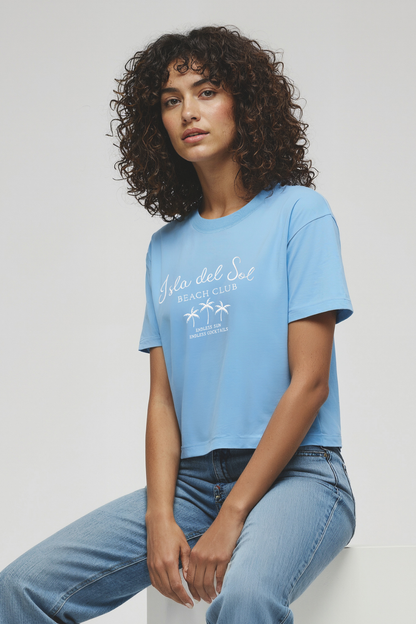Woman wearing a light blue t-shirt with &