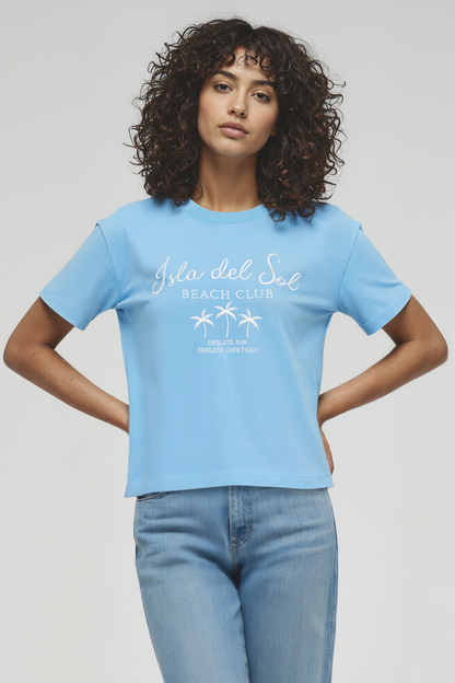 Woman wearing a light blue t-shirt with &