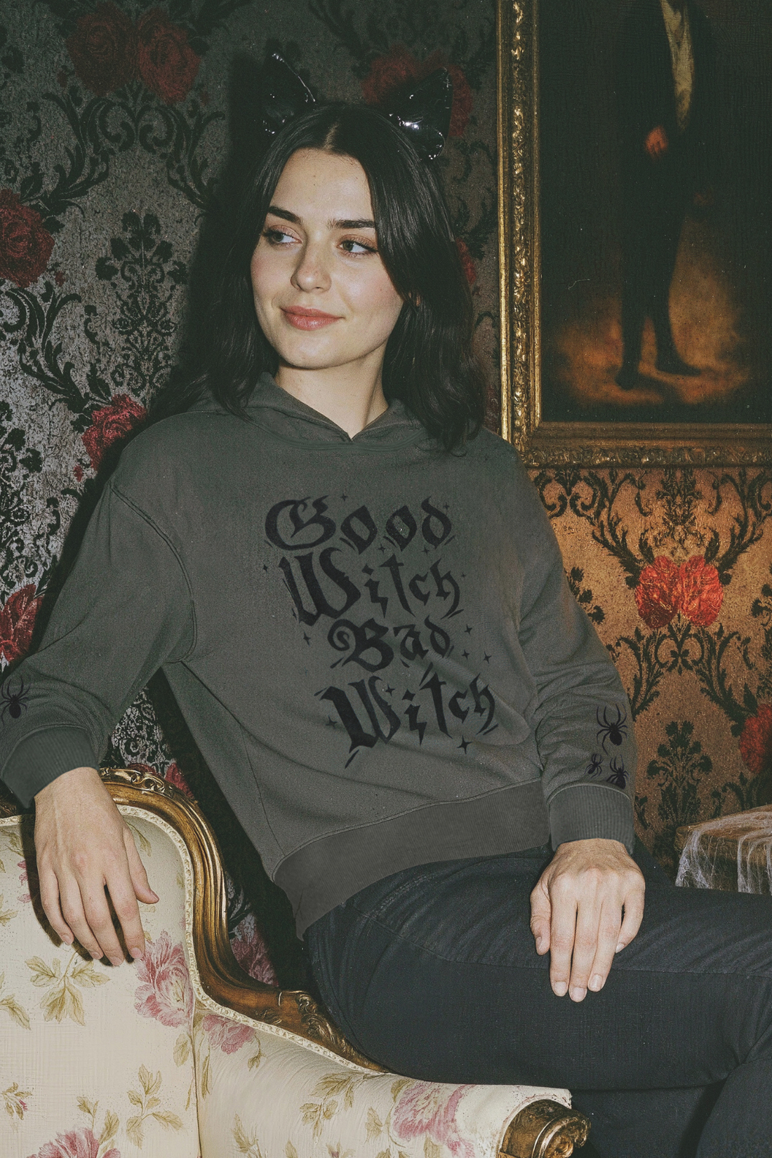 Woman wearing a hoodie with &