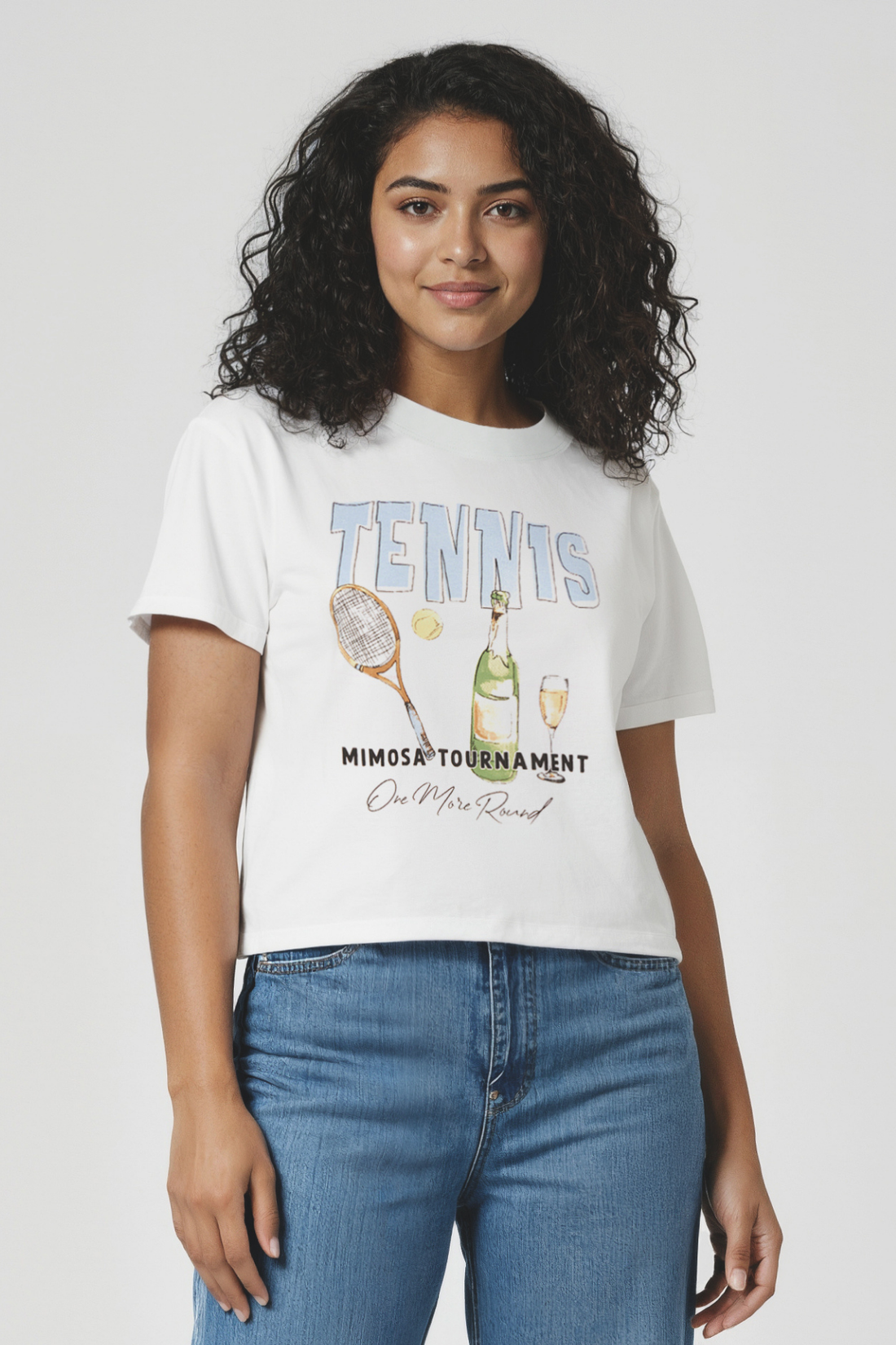 Woman wearing a light blue t-shirt with &