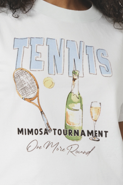 Close up of a woman wearing a light blue t-shirt with &