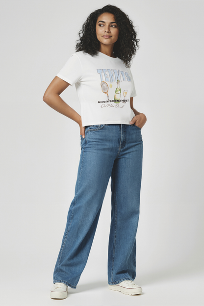 Woman wearing a light blue t-shirt with &