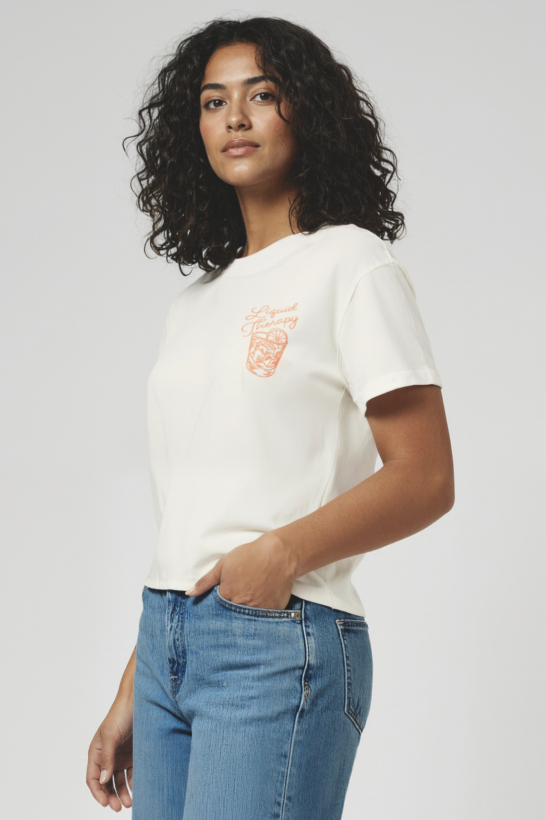Woman wearing a white t-shirt with &