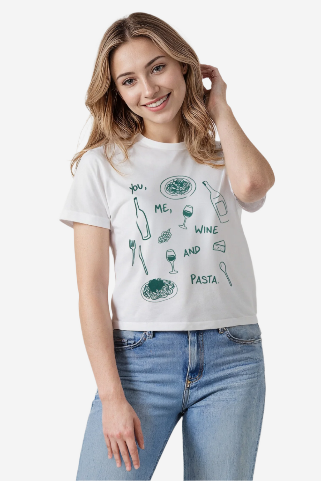 A woman wearing a white cropped crewneck t-shirt with text reading, "You, me, wine and pasta" with images of spaghetti, wine, cheese and utensils.
