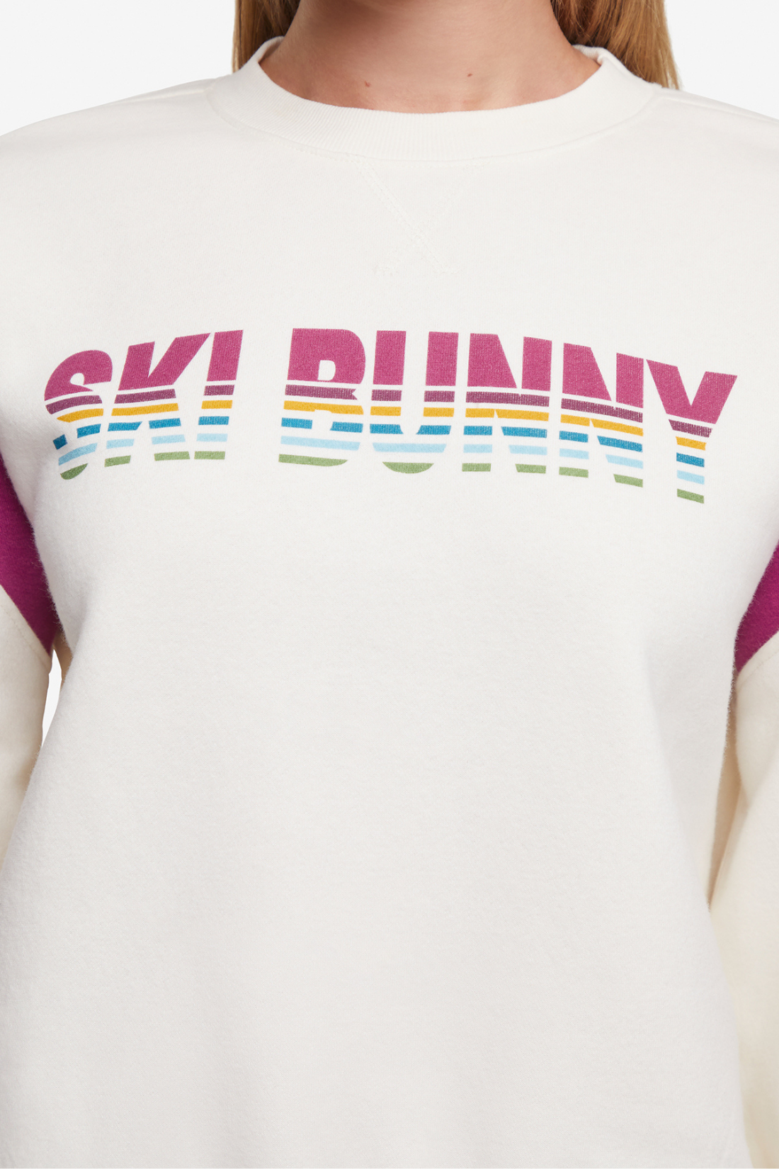 Close up of White sweatshirt with colorful &