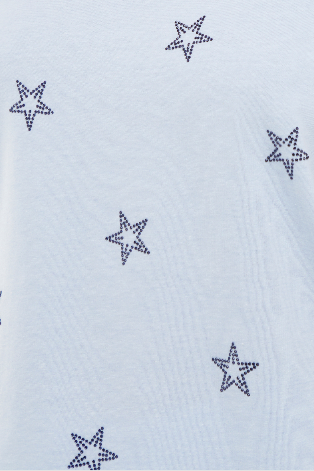 Close up of Light blue sleeveless top with rhinestone star patterns