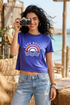 Woman wearing a blue t-shirt with &