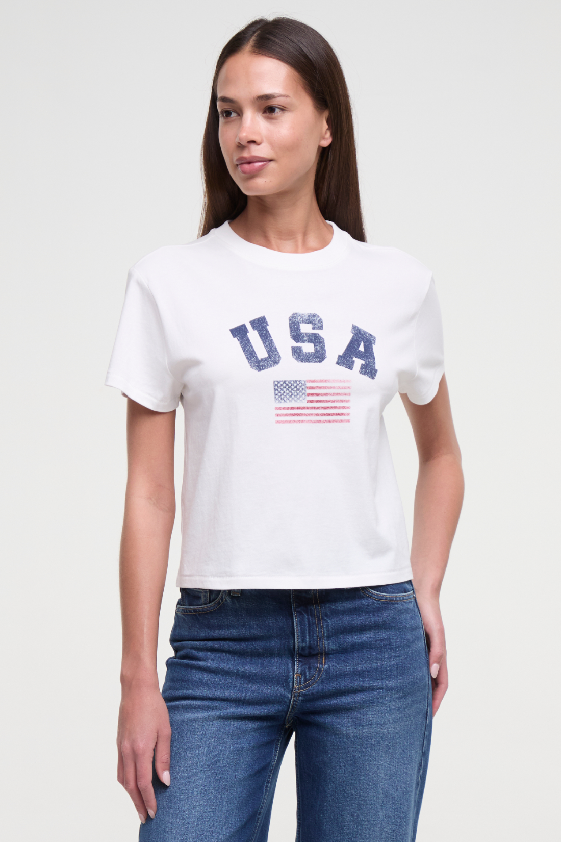 Front view of woman wearing a white t-shirt with &