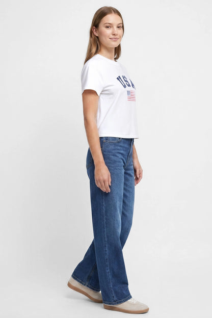 Side view of woman wearing a white t-shirt with &