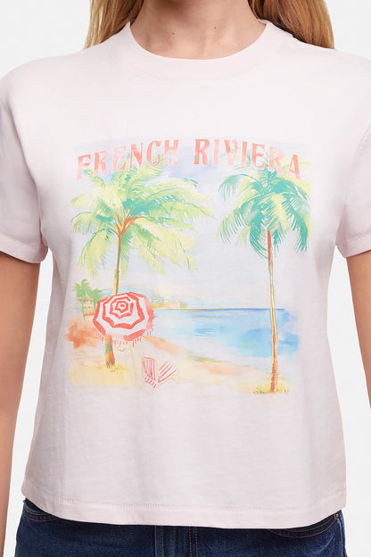 Close up of T-shirt with a beach graphic and &