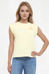 Front view of woman wearing light yellow t-shirt with sun graphic design and blue jeans on a white background. 