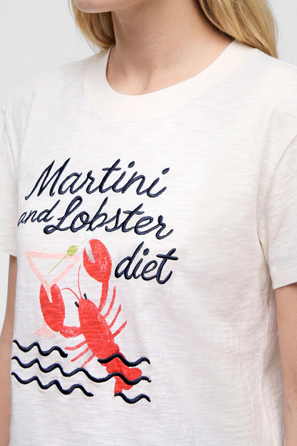 Close-up front view of woman wearing a white t-shirt with &