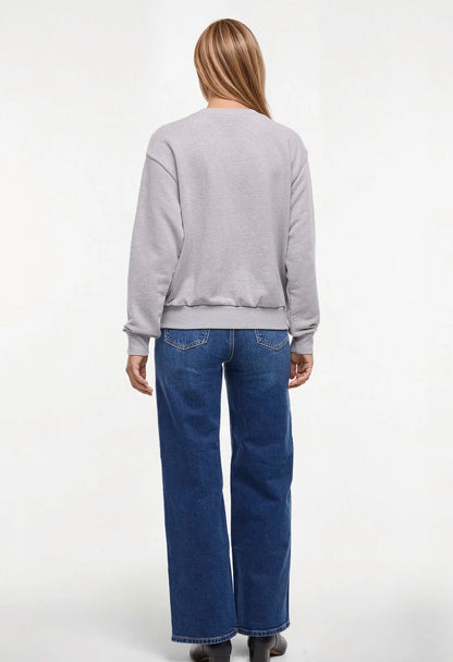 Back view woman wearing a heather gray sweatshirt with &