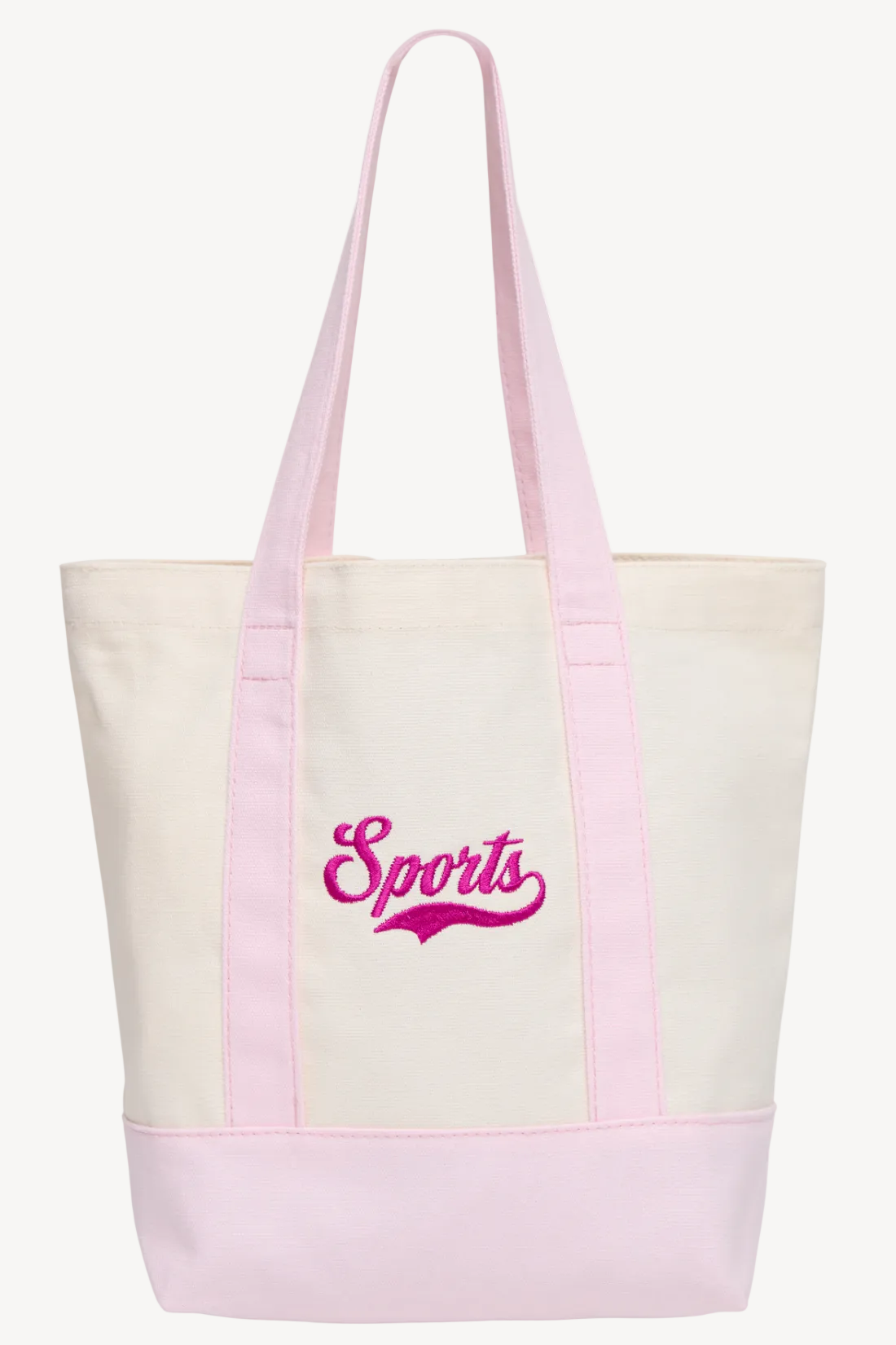 An off-white canvas tote bag with light pink handles and bottom trim, featuring the word &