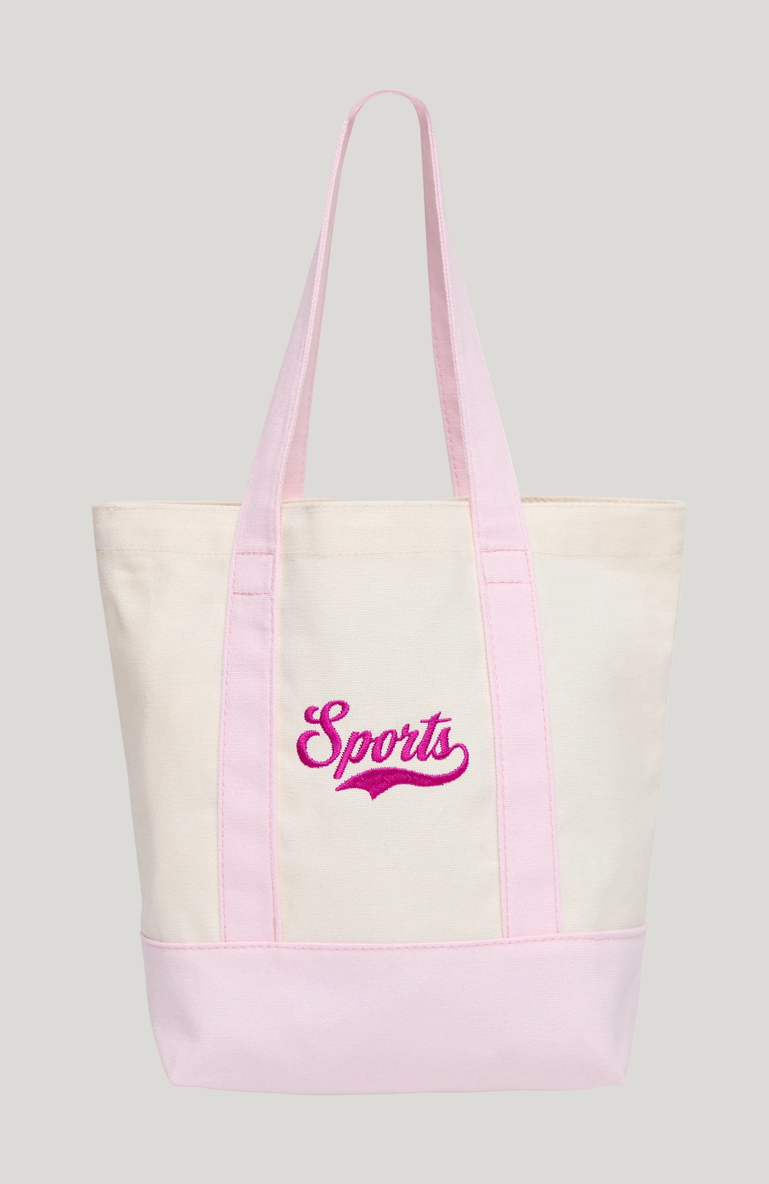 An off-white canvas tote bag with light pink handles and bottom trim, featuring the word &