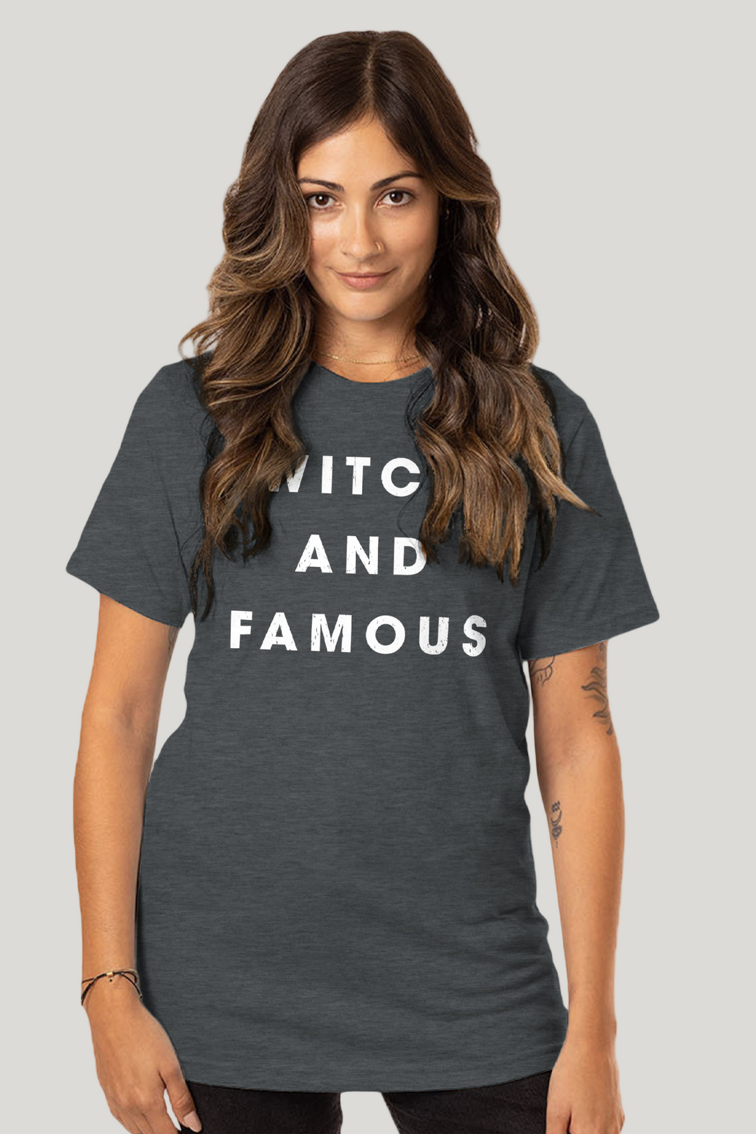 Woman wearing a dark gray t-shirt with &