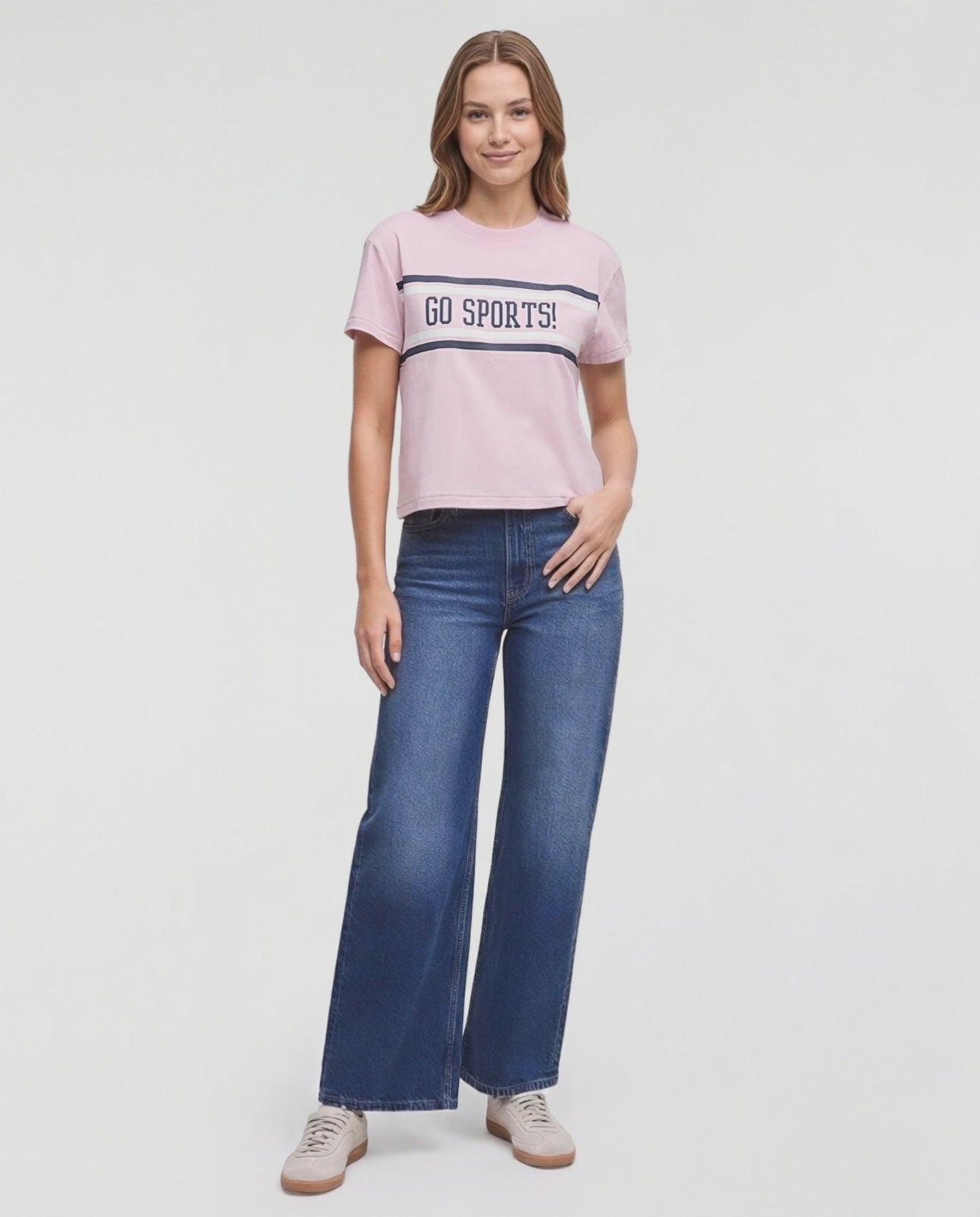 Video of a woman modeling a light pink short-sleeve t-shirt with &
