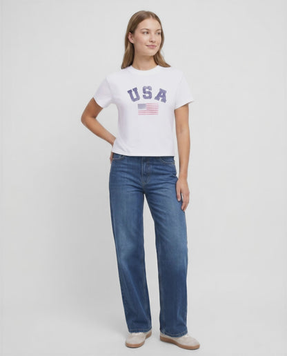 Video view of woman wearing a white t-shirt with &