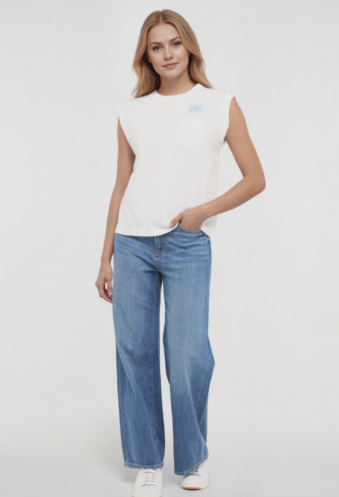 Video view of woman wearing a white t-shirt with "LAS PALMAS BEACH CLUB; GRAN CANARIA, ESPANA" text and graphic design featuring two palm trees and blue jeans on a white background. #color_snow-white